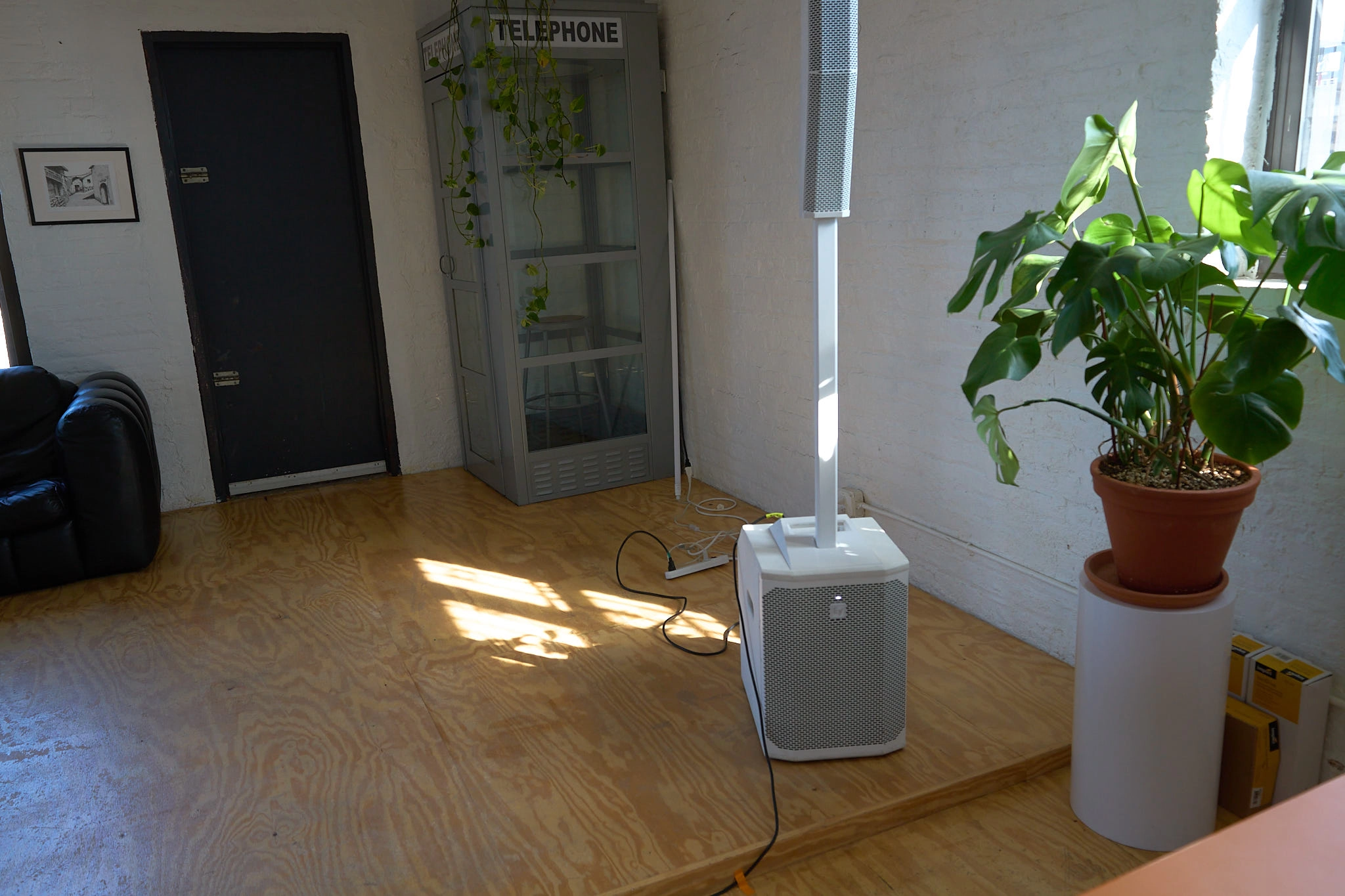 Two telos.haus members working together at a round table.