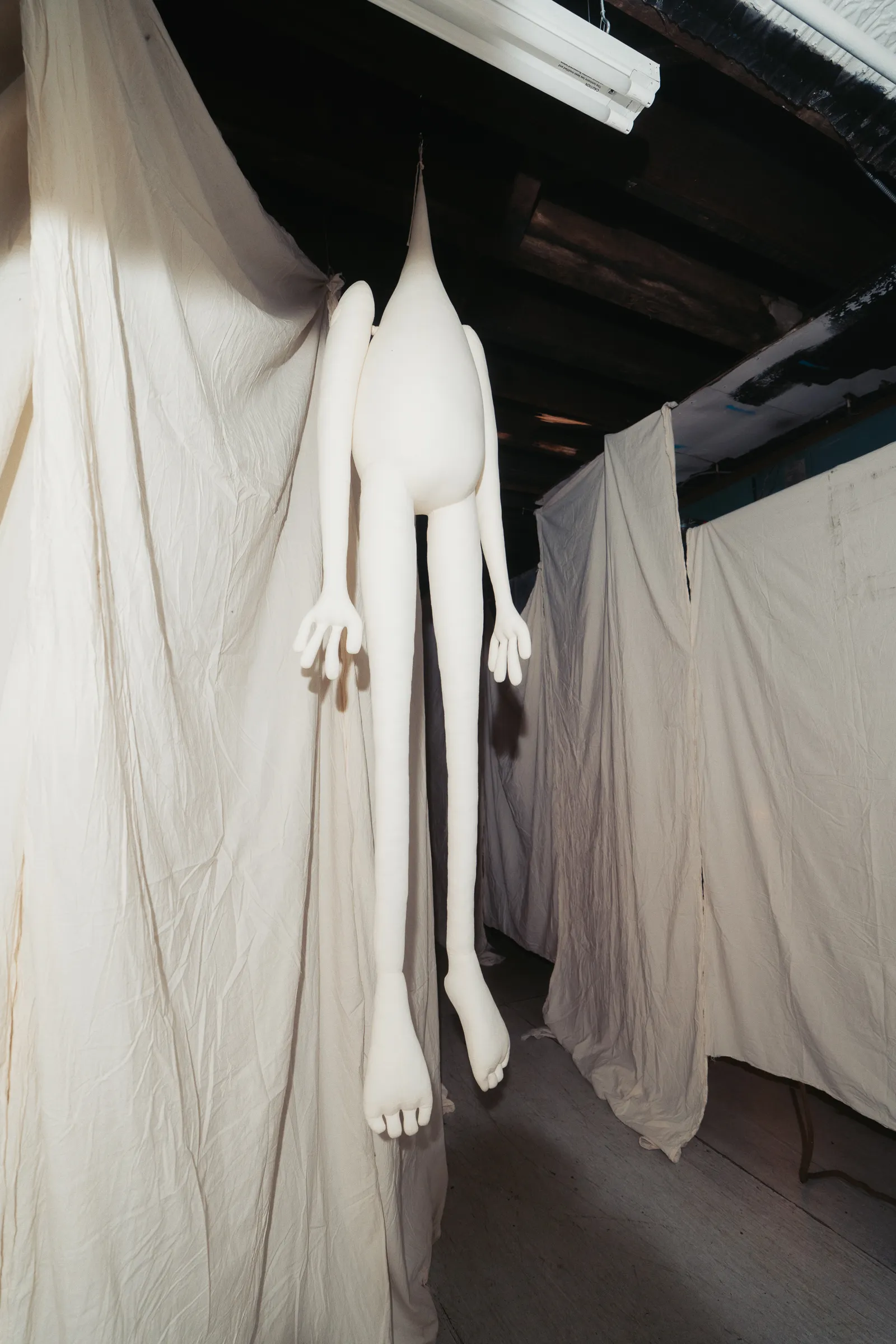 a large soft sculpture by studio wenjüe lu greets you as you enter the garden